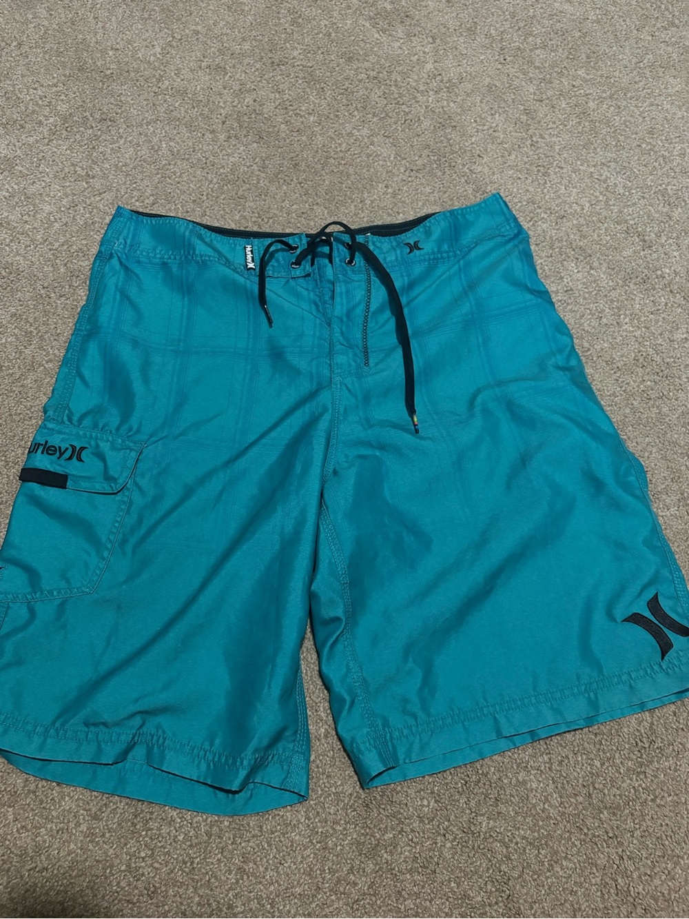 Hurley Men's Teal board shorts. Size 33.